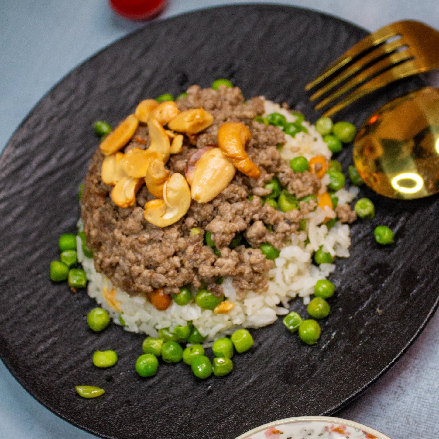 Reis mit Erbsen und Hackfleisch