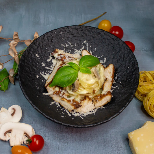 Fettuccine mit gegrilltem Hähnchen und Pilzen